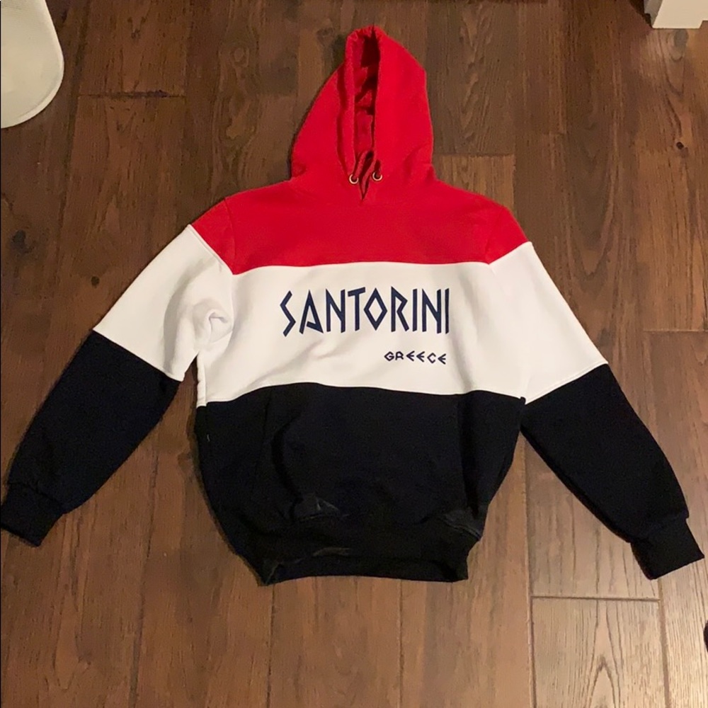 red, black, and white sweatshirt